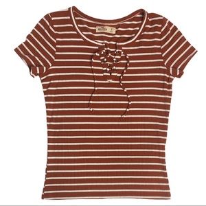 Hollister rust and white striped fitted tee with lace-up front design! 🤍